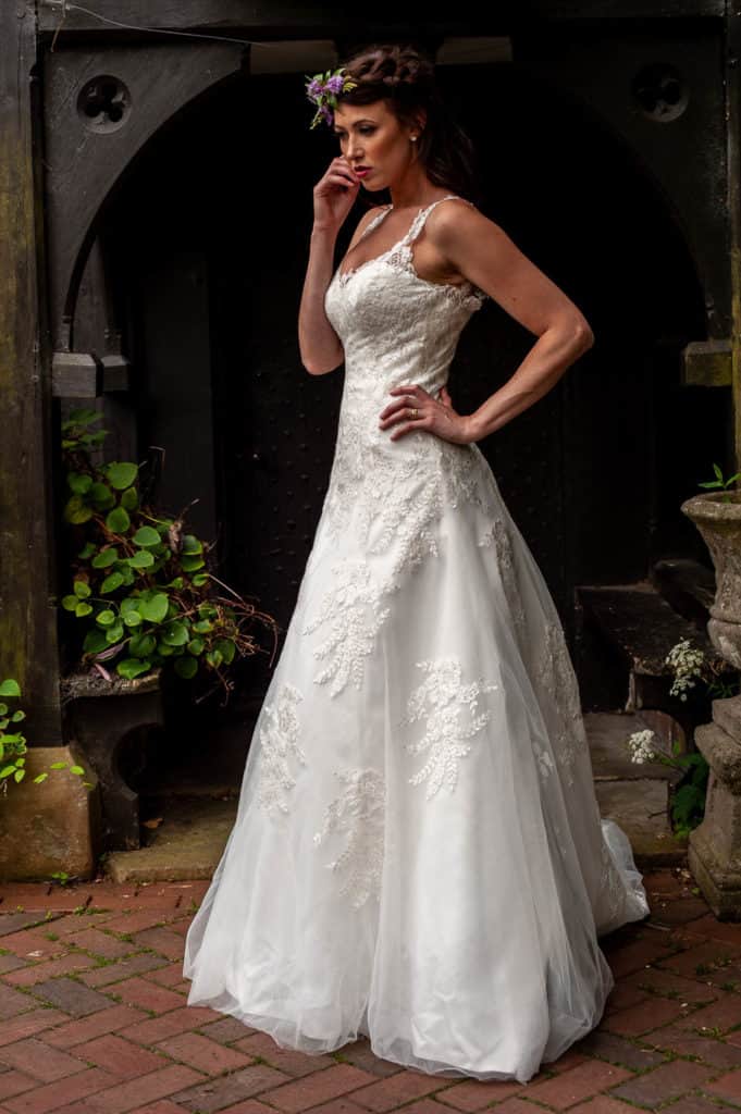 model posing in white wedding dress