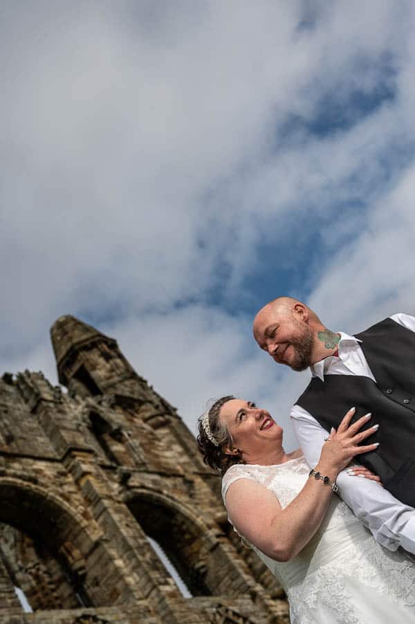 Wedding portrait in front of Whitby Abbey